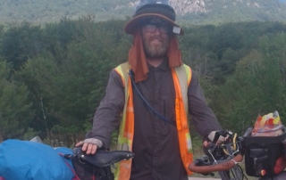 Ritchie Wolfe Rides Bicycle across America Raise Money Restoration House
